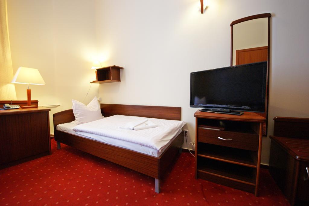 Hotel Staromiejski Слупск Стая снимка