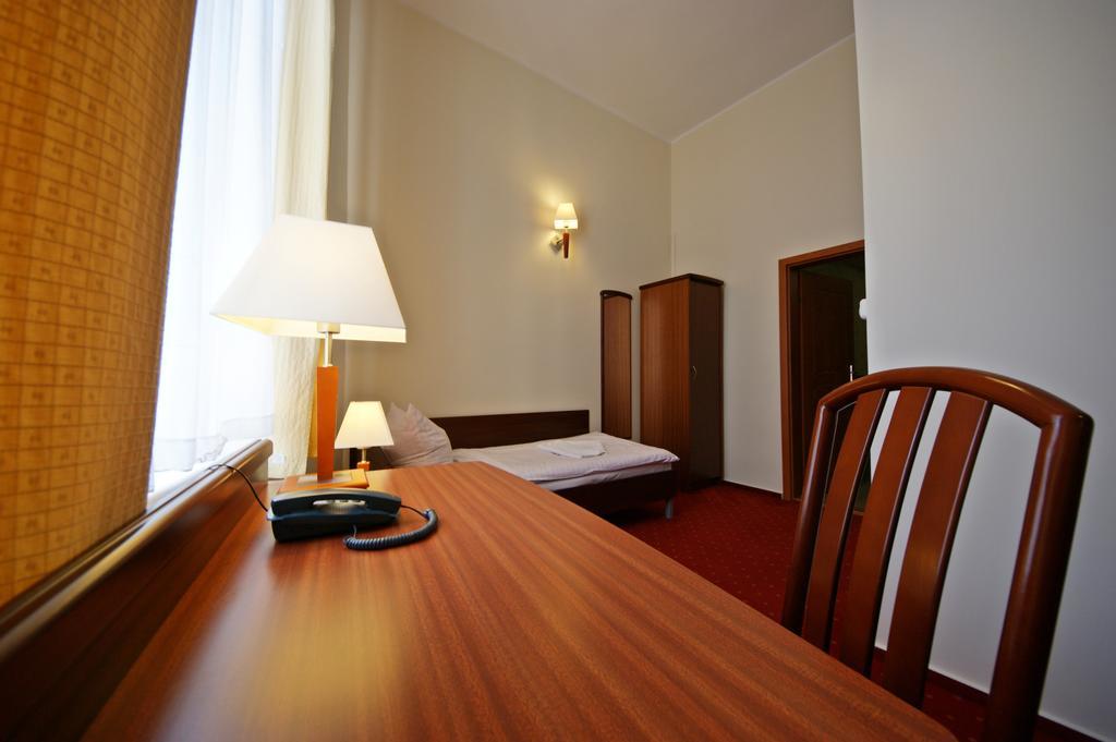 Hotel Staromiejski Слупск Стая снимка